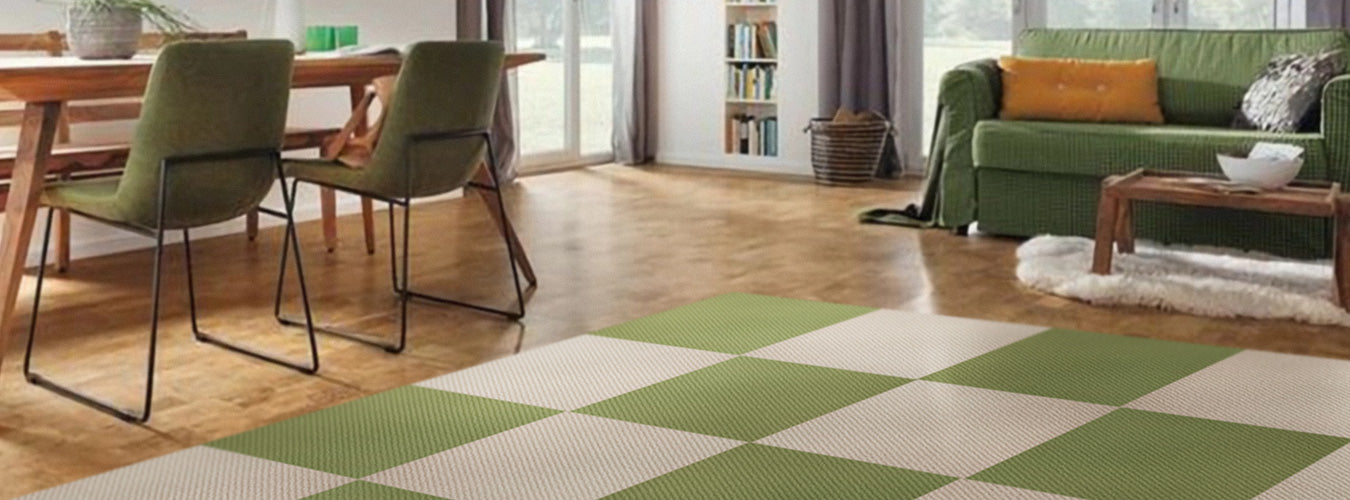 In a living room filled with green elements, Matace green and beige Berber carpet squares are laid out next to sofas and dining tables.