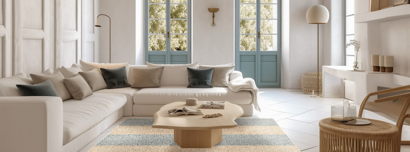 Matace Carpet Tiles in SLATE gray and brown are found in a Mediterranean, Danish-designed living room.