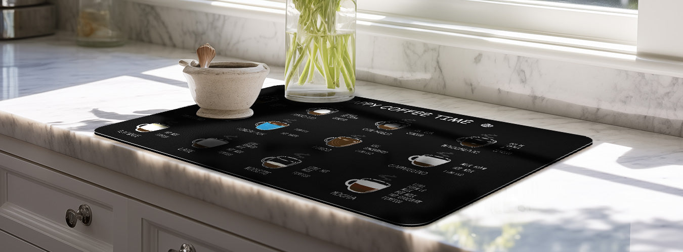 On a clean, uncluttered kitchen counter, Matace Coffee Mats are spread.